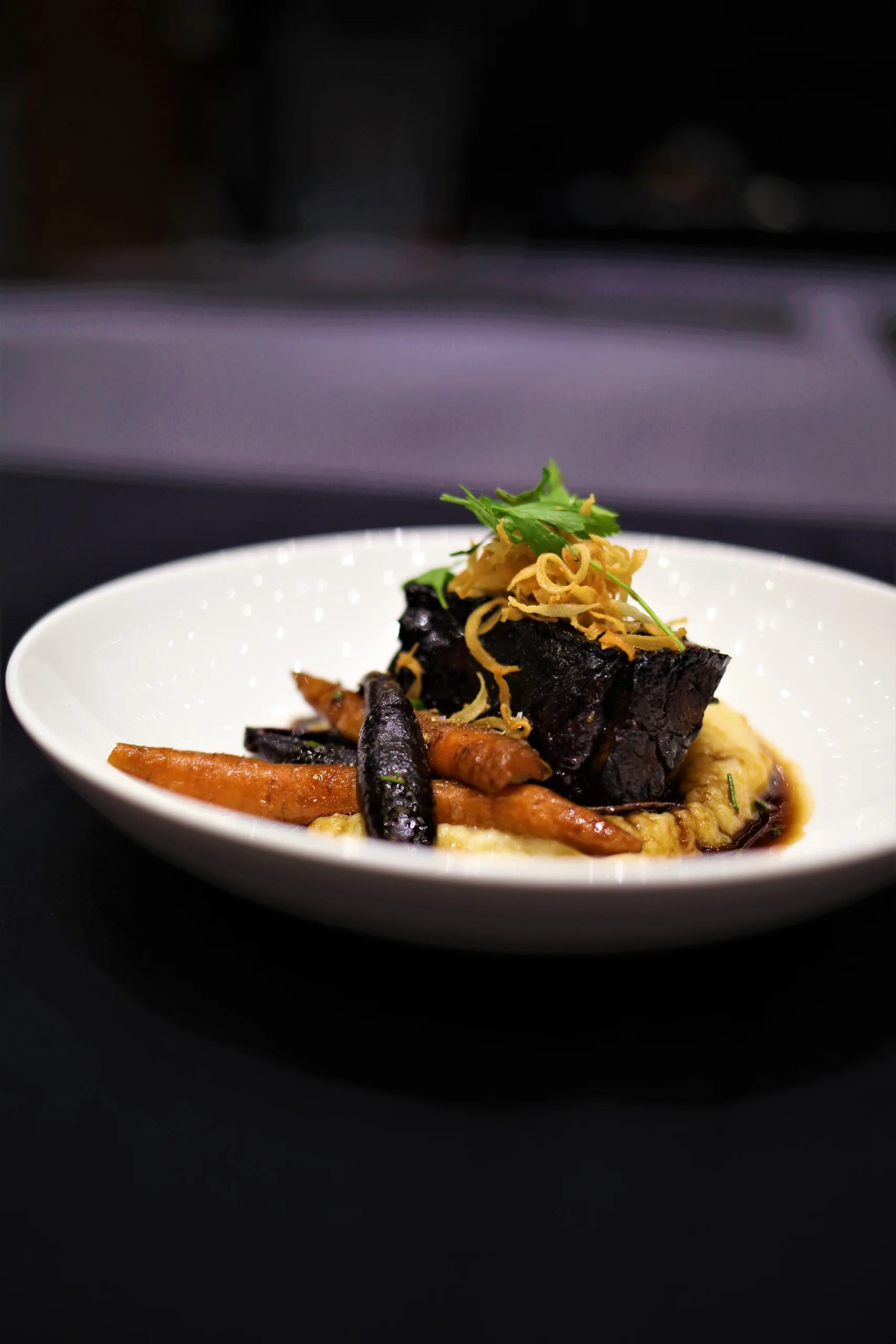 Sliced dry-aged ribeye with bone-marrow jus