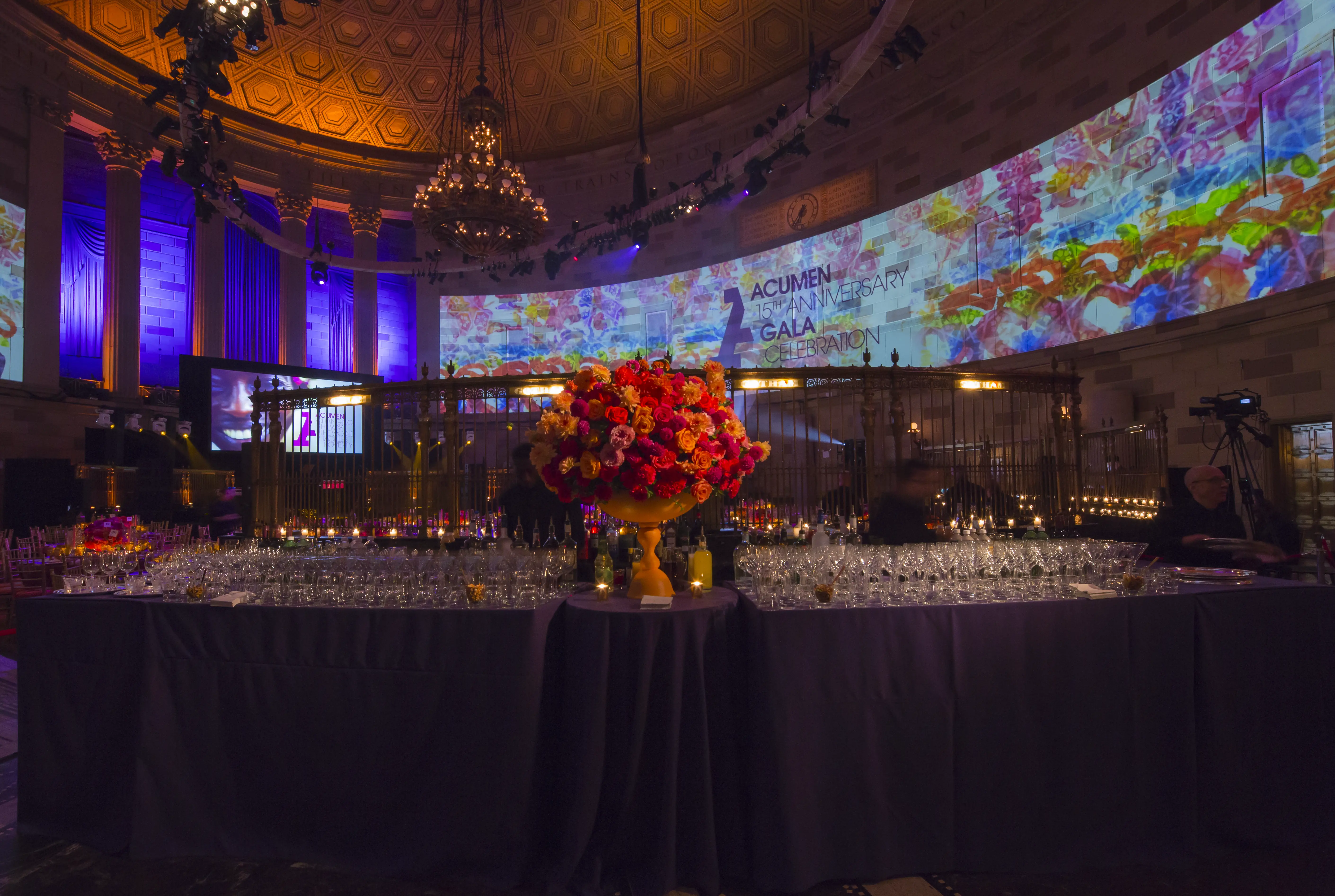 Champagne tower being poured at a black-tie gala